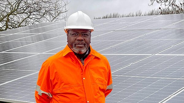Ade Adeyemo at a solar farm